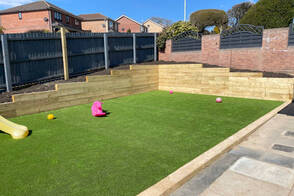 installed artificial grass on a playground